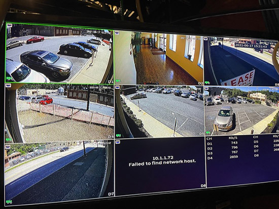 parking lot security feed on monitor